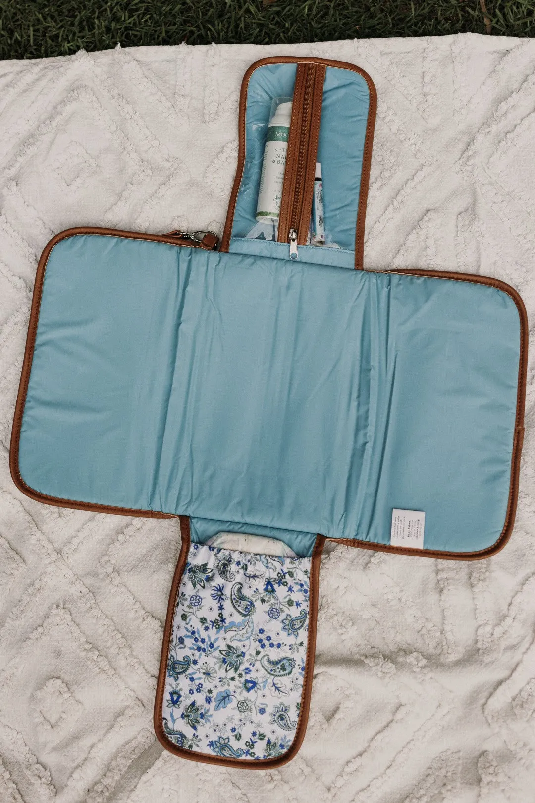 OiOi Change Clutch - Blue Paisley/Tan